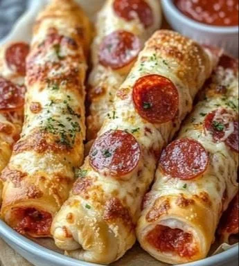 Pepperoni Pizza Roll Breadsticks served with marinara sauce