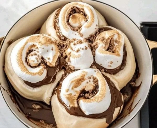 Delicious S'mores Roll Ups prepared with chocolate and marshmallows